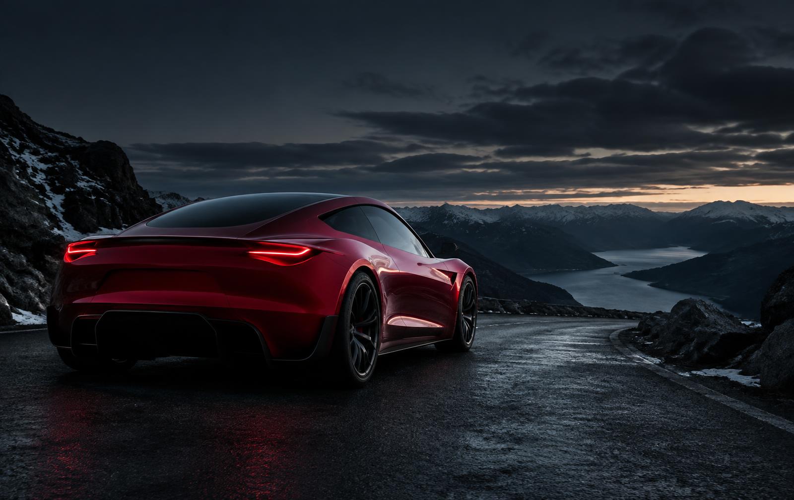 Tesla Roadster ready to order on a mountain road at dusk
